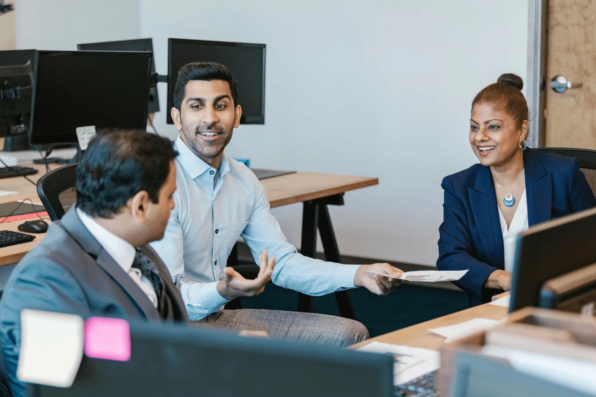 LedgersLogic team collaborating with an Indian client