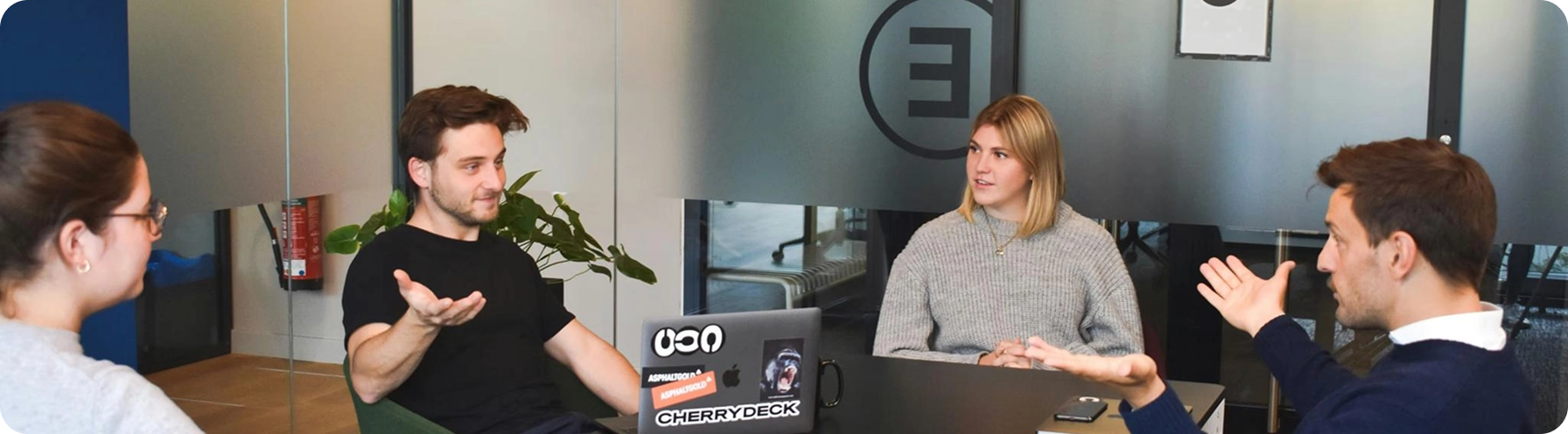 The LedgersLogic team collaborating in the office